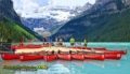 Lake Louise Canadian Rockies red boats on blue green waters