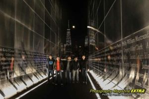 Liberty State Park 9/11 wall with a group of young men.