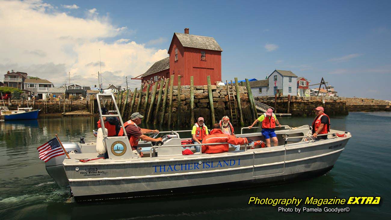 Rockport MA men leaving on a boat in front of mode of one.