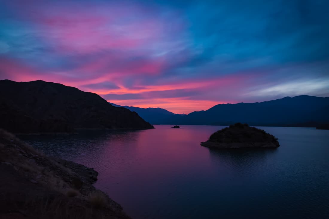 Cotton Candy - Nathan Cox - Beautiful purple and pink skies over blue silky water reflecting the colors