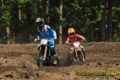 Motocross kids riding dirt bikes in Raceway Park, New Jersey