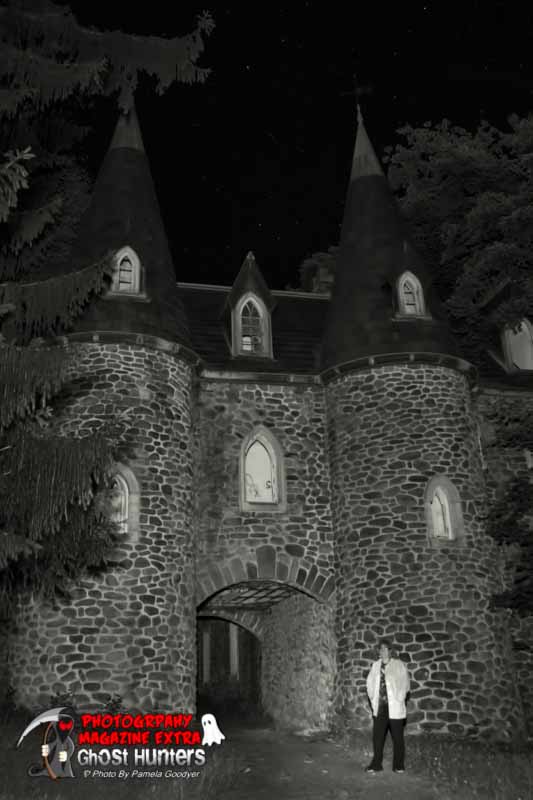 Jerry Lynn Pacaro in front of Dundas Castle while ghost hunting in upstate New York several years ago, black and white photo.