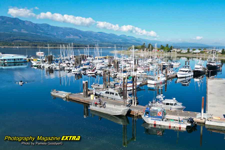 Bay Marina Photography With boats blue waters and cloudy skies.