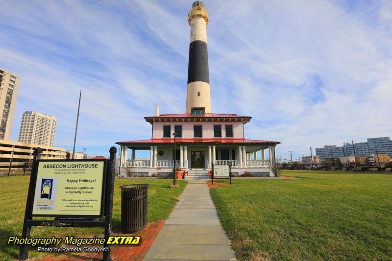 I'm seeking lighthouse with the sign in front.